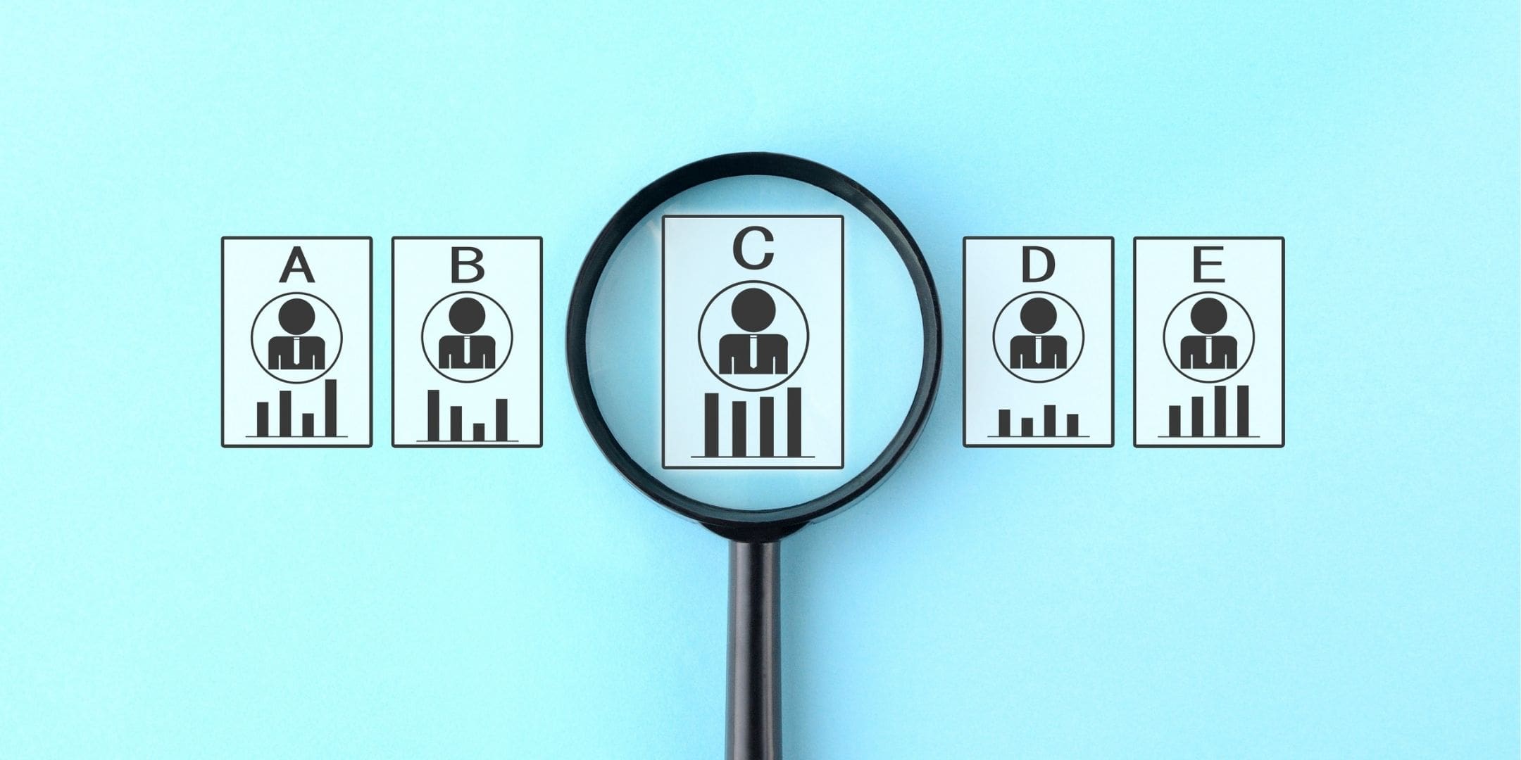 magnifying glass over small thumbnails of figures labelled a-e
